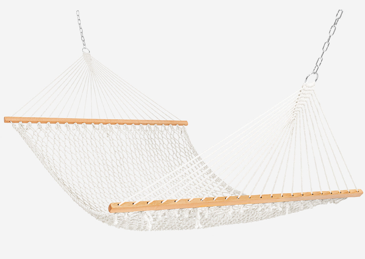 Beige hammock with wooden slats on a white background