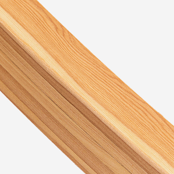 Close-up of a wooden panel with a light brown color on a white background