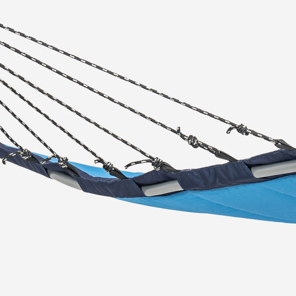 Blue hammock with metal ropes on a white background