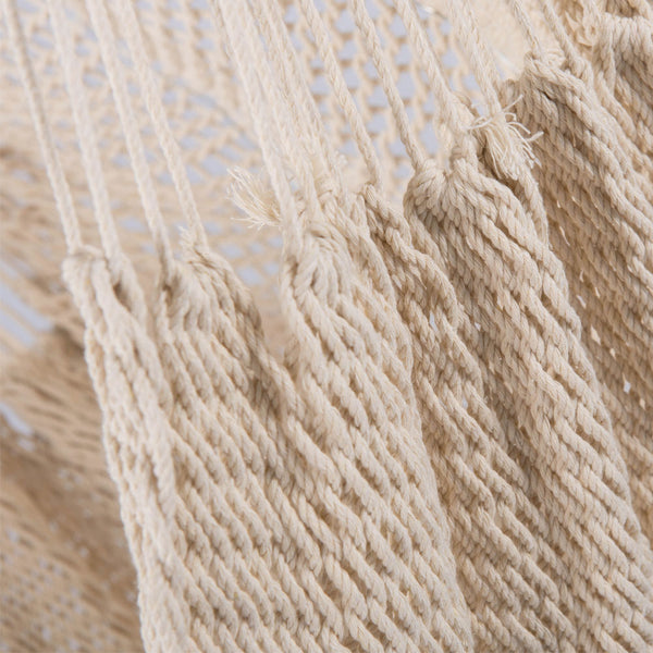 Close-up of beige yarn with a textured surface
