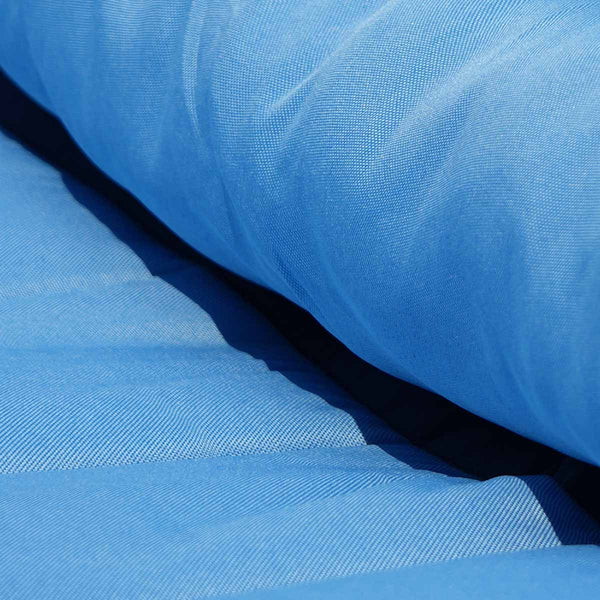 Close-up of blue fabric with a textured pattern