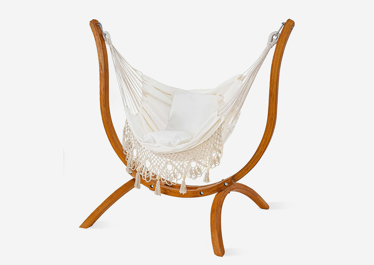 White hammock with wooden stand on a white background