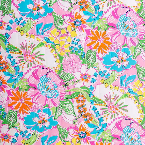 Colorful floral pattern on a pink background