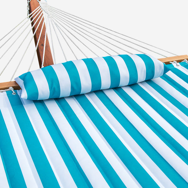 Roll-up turquoise and white striped hammock with wooden frame