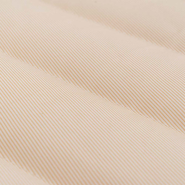 Detailed picture: Close-up of beige fabric with a subtle pattern