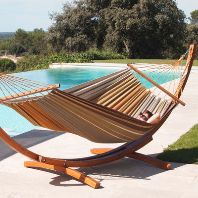 Lazy Daze hammock stand supporting a hammock, ideal for outdoor relaxation.#color_brown