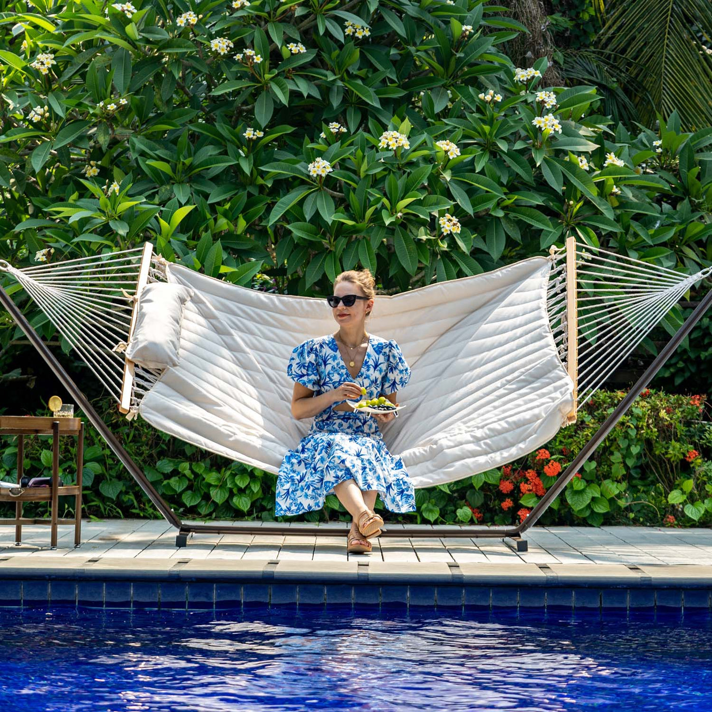 Lazy Daze hammock stand in a serene outdoor backyard setup.#color_coffee