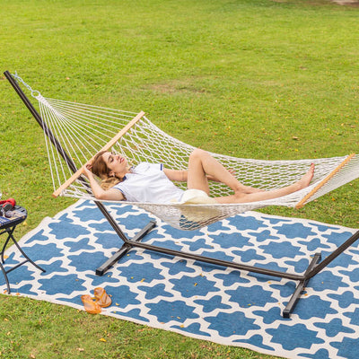 Lazy Daze 15 FT Steel Hammock Stand with hammock on the grass.#color_black