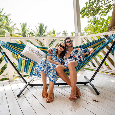 Lazy Daze Brazilian Premium Polycotton Fabric Hammock Combo set up in a backyard.#color_blue-yellow