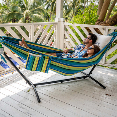 Lazy Daze Brazilian Premium Polycotton Fabric Hammock Combo in a cozy backyard scene.#color_blue-yellow