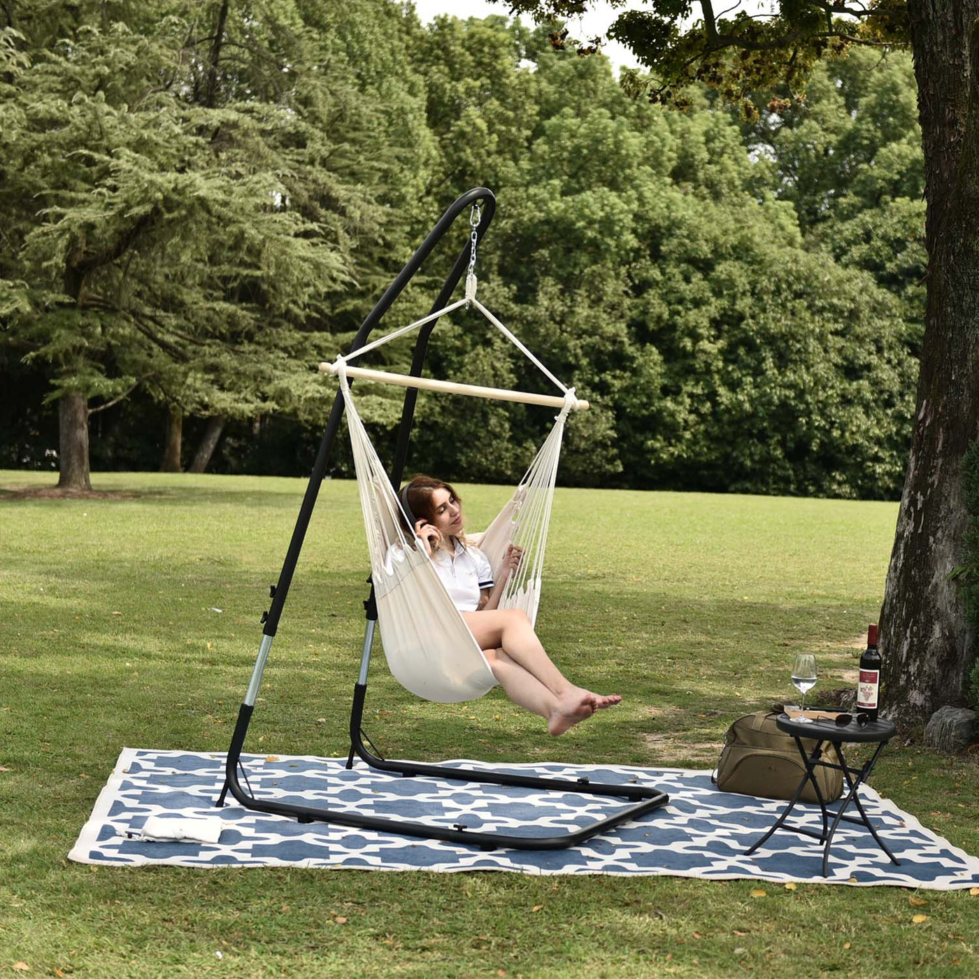 Lazy Daze hammock chair with pillows in a outdoor setting.#color_natural