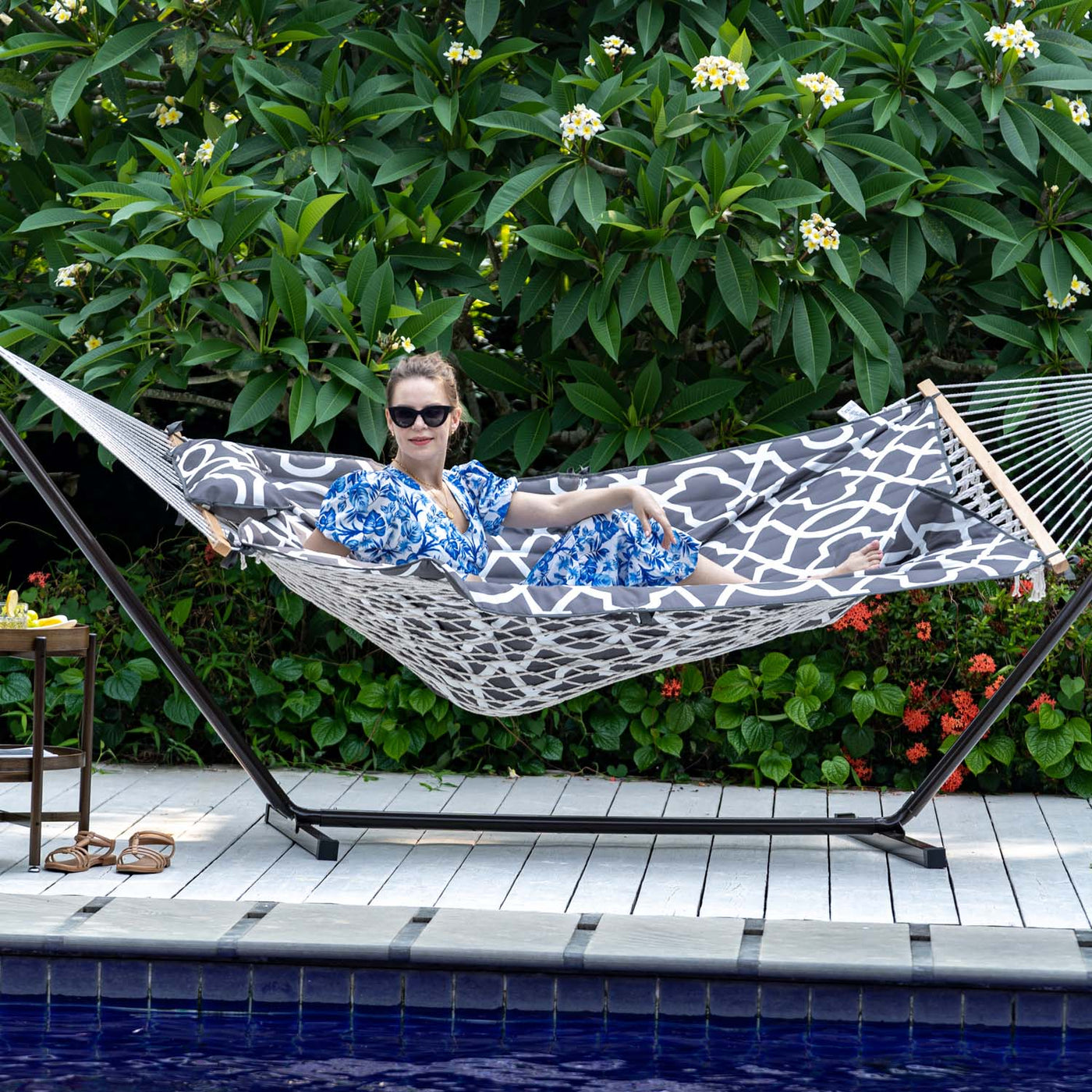 Lazy Daze Cotton Rope Hammock Combo, woman relaxing in the backyard.#color_gray-white