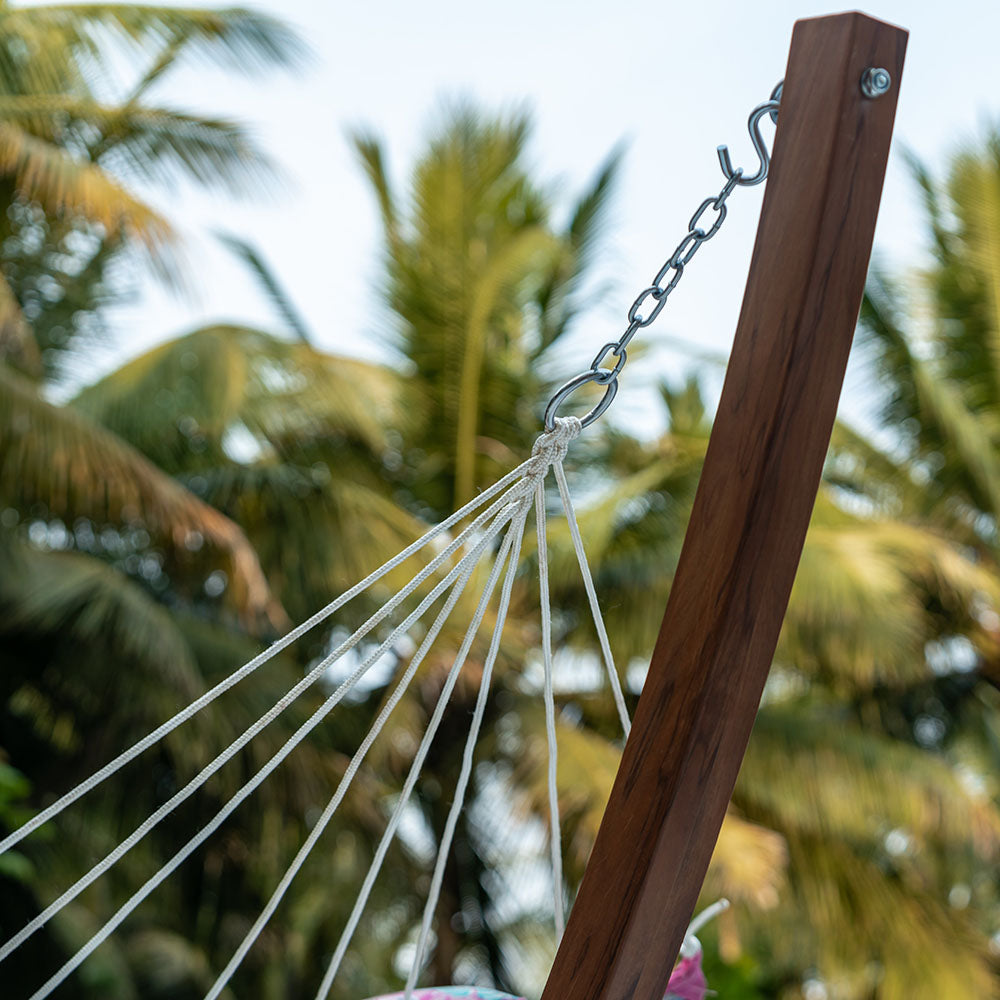 Detailed view of the crafted rope knot on Lazy Daze Double Hammock with Curved Spreader Bar in Illy.#color_illy