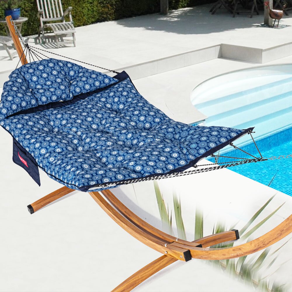 Lazy Daze Double Hammock with Curved Spreader Bar in navy displayed on the backyard.#color_navy