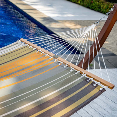 Detailed view of the hardwood spreader bar on Lazy Daze Double Poolside Hammock in Coffee Stripes.#color_coffee-stripes