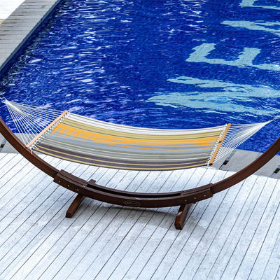 Lazy Daze Double Poolside Hammock in Coffee Stripes set up by the poolside.#color_coffee-stripes