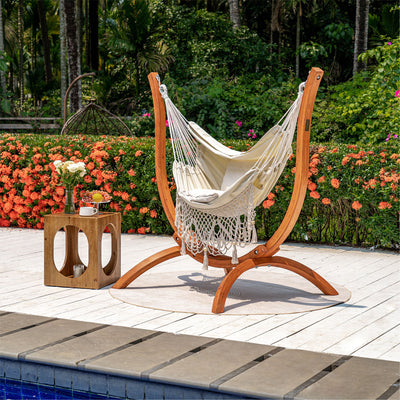 Lazy Daze hammock chair with wooden stand placed in a backyard.