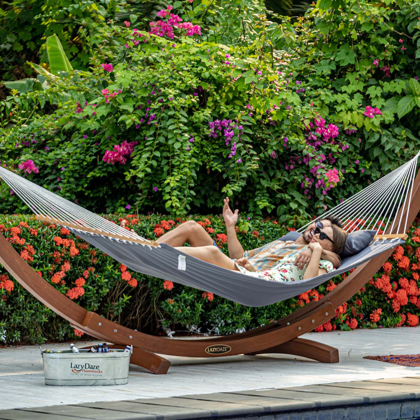 Lazy Daze large double quilted hammock, a couple enjoying a peaceful moment together in the backyard.#color_dark-gray