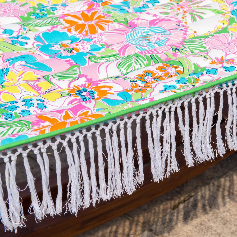 Close-up view of the Lazy Daze large double reversible quilted hammock, highlighting the decorative tassels.#color_floral