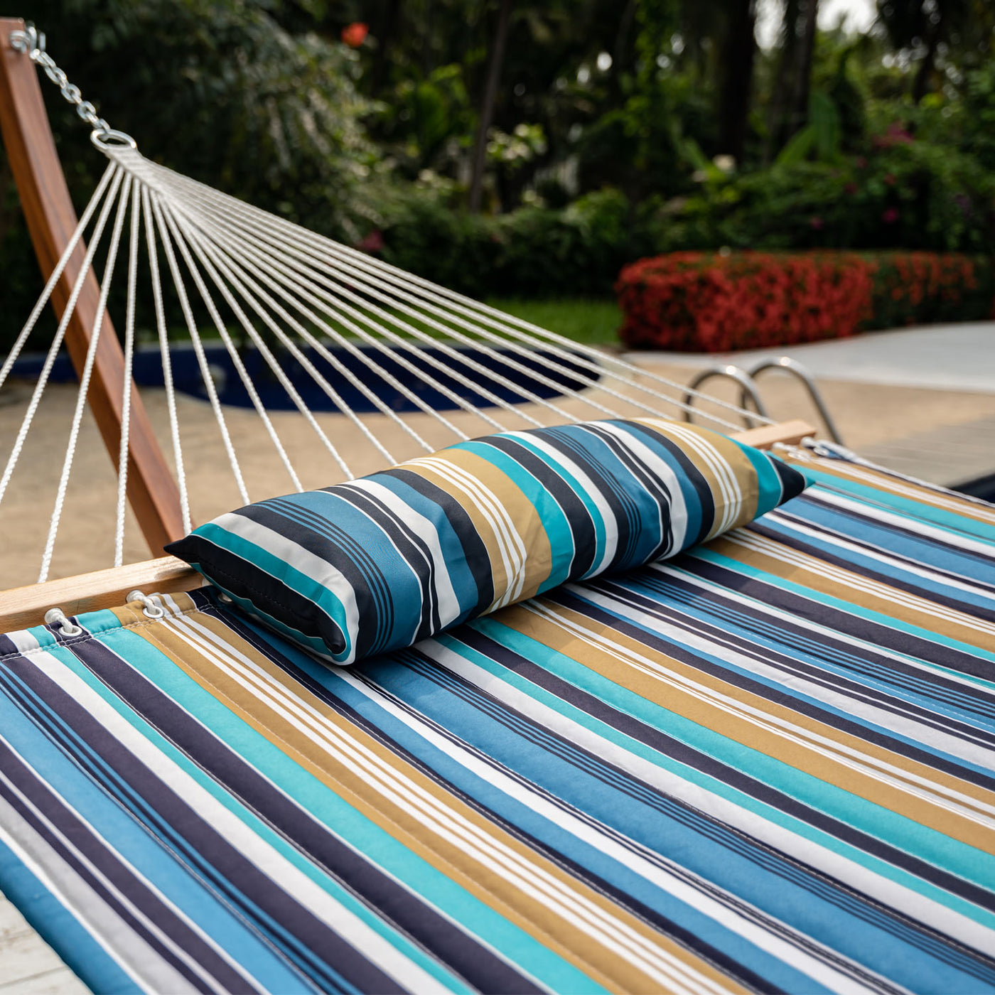 Soft comfort fabric and detachable pillow of the Lazy Daze Large Double Stripes Quilted Hammock.#color_beaches-stripes