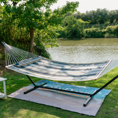 Lazy Daze Large Double Stripes Quilted Hammock in Forest Stripes set up on a grassy backyard.#color_forest-stripes