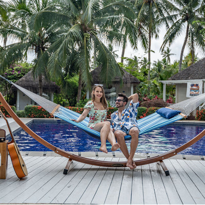 Lazy Daze Large Double Stripes Quilted Hammock in a backyard, relaxing scene.