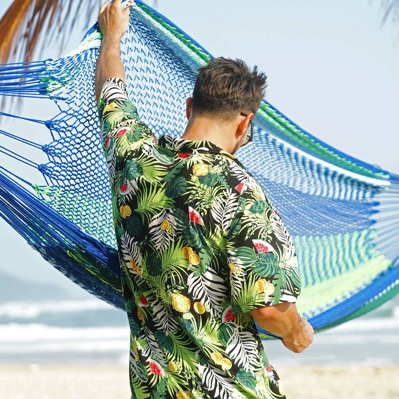 Durable wear-resistant knot on Lazy Daze Mayan Family Hammock in blue and green stripes.#color_blue-and-green-stripes