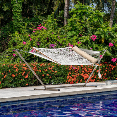 Lazy Daze rope hammock combo without cushion on a steel stand, set up on backyard grass.#color_tan-pillow