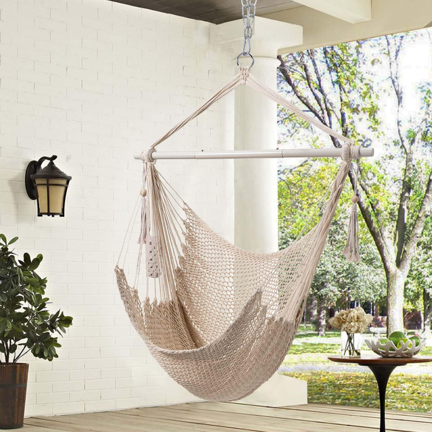 Lazy Daze beige rope swing chair hanging in a cozy indoor space.#color_beige