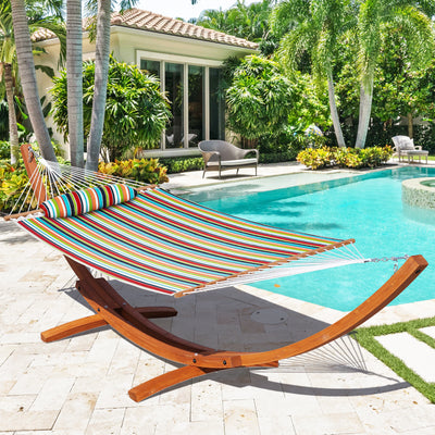 Lazy Daze Sunbrella Double Quilted Hammock in Carousel Confetti set up beside a backyard pool.
#color_carousel-confetti