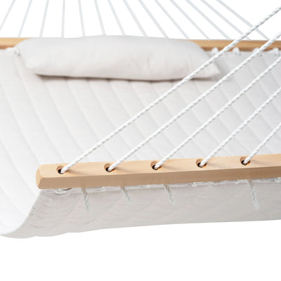 The hardwood spreader bar on the Lazy Daze Sunbrella Double Quilted Hammock in Cream.#color_cream