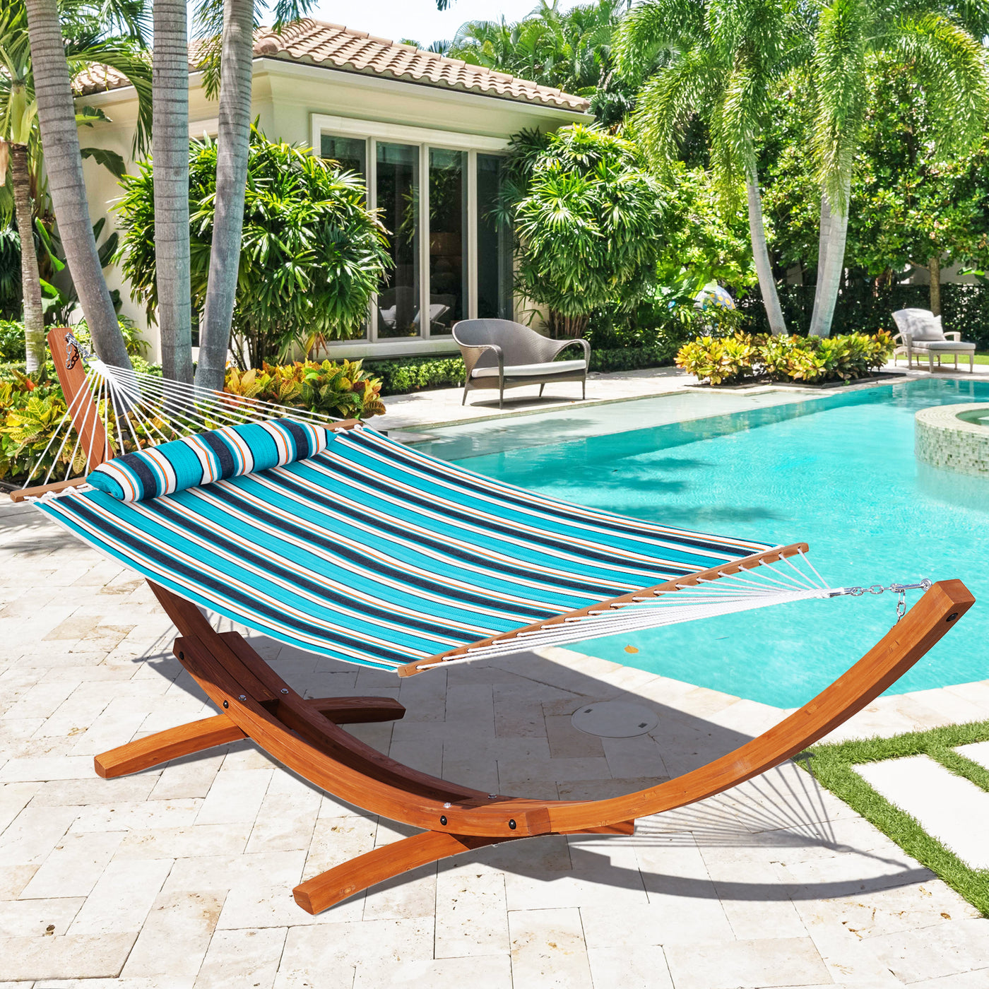 Lazy Daze Sunbrella Double Quilted Hammock in Gateway Mist set up by the poolside in a backyard.#color_gateway-mist