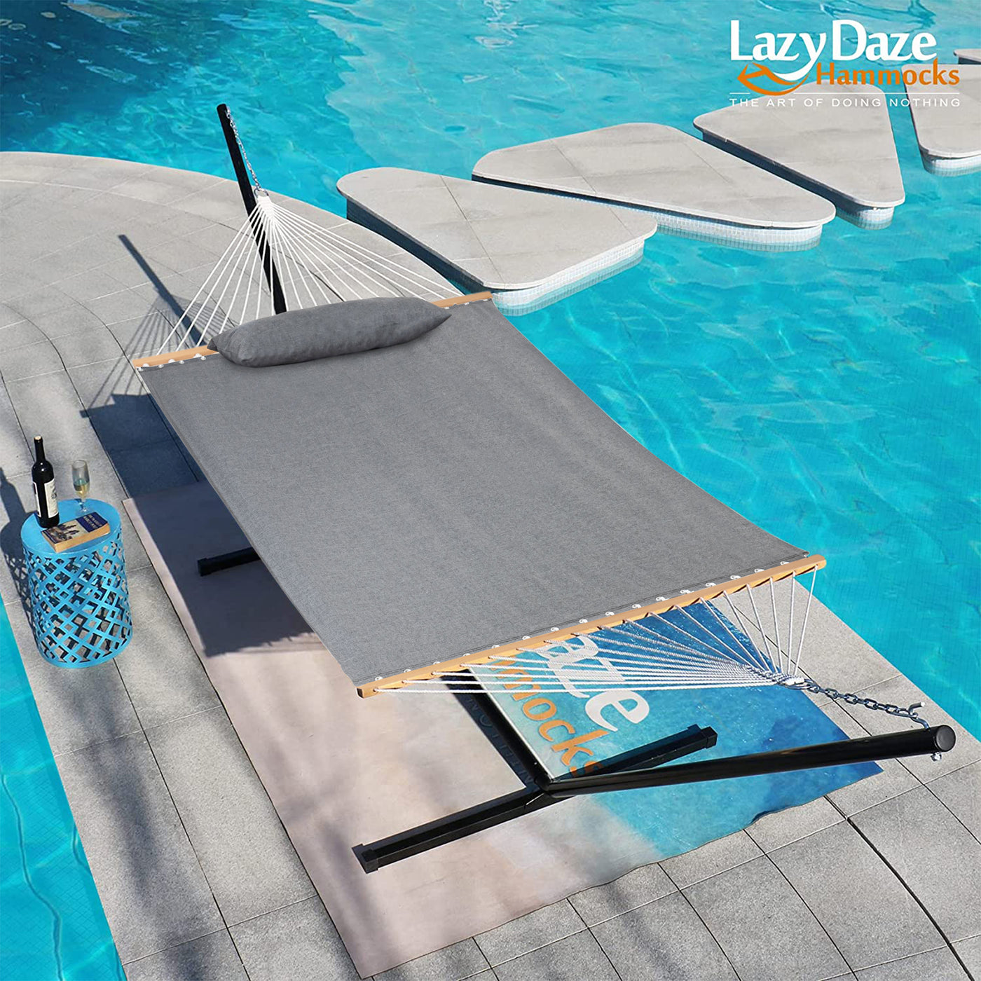 Another angle of the Lazy Daze Sunbrella Single-layer Hammock in Gray by the pool, ideal for a peaceful rest.#color_gray