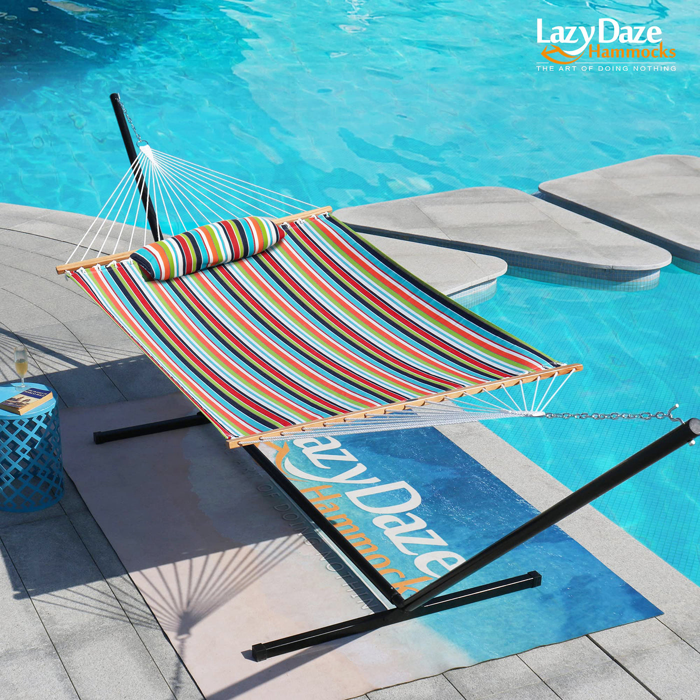 Lazy Daze Sunbrella Single-layer Hammock in orange, set poolside in a relaxed outdoor space.#color_orange